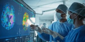 Two surgeons looking at a ct scan of a brain and the tumor.